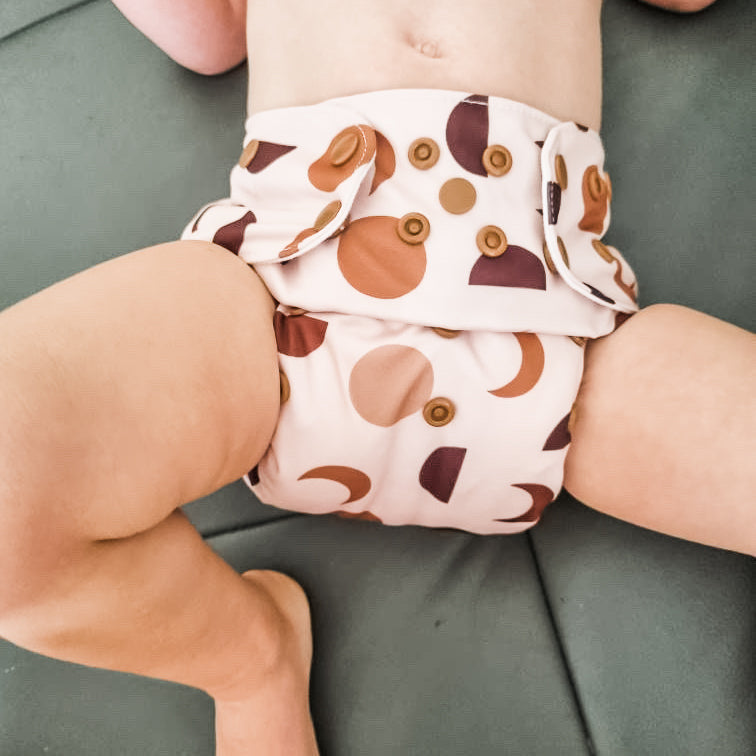 Moon phase cloth nappy &#39;on the bum&#39;. Australian owned and designed cloth nappies. 