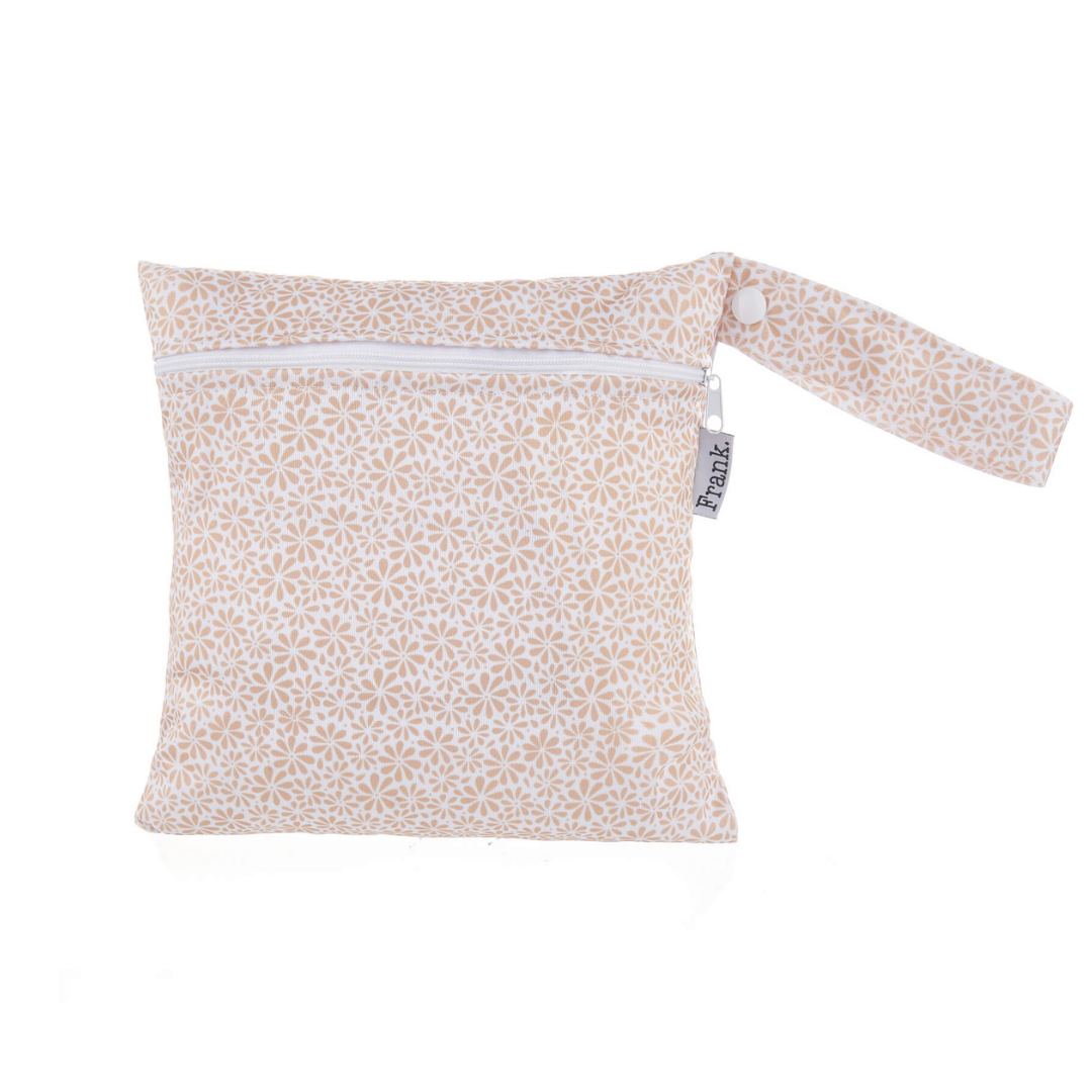 Small nappy wet bag in golden daisy print