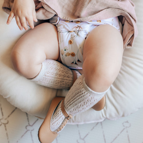 cloth nappy in gender neutral floral print